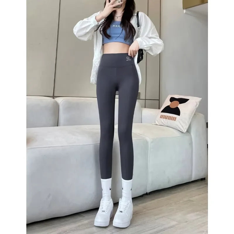 New Women's Solid Color Nine Points Raised Belly Buttock Shark Yoga Pants Show Tall And Thin All Matching Leggings